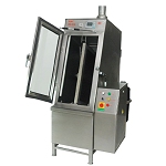 A single-chamber spray-in-air fully automated
vertical cleaning machine